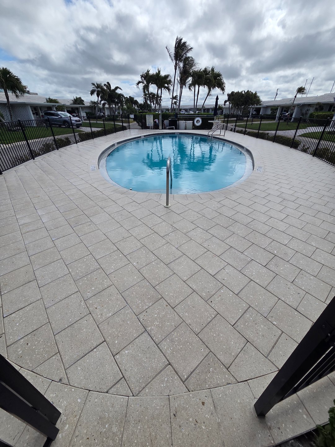  Shellock pool deck on White Cap, Venice Island after we leveled some loose pavers, cleaned, sanded and sealed it.  Thumbnail