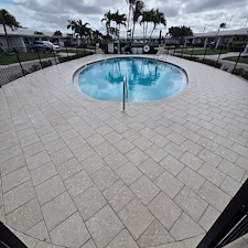 Shellock-pool-deck-on-White-Cap-Venice-Island-after-we-leveled-some-loose-pavers-cleaned-sanded-and-sealed-it 0