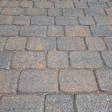 Exterior-maintenance-performed-on-this-home-in-the-Beachwalk-Community-of-Englewood-started-with-a-softwash-of-the-house-and-cage-as-well-as-driveway-and-pool-deck-paver-sealing 2