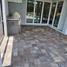 Exterior-maintenance-performed-on-this-home-in-the-Beachwalk-Community-of-Englewood-started-with-a-softwash-of-the-house-and-cage-as-well-as-driveway-and-pool-deck-paver-sealing 0