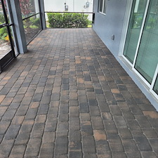 Exterior-soft-wash-and-paver-sealing-maintenance-keeps-the-curb-appeal-fresh-in-the-Beachwalk-Community-of-Englewood 0