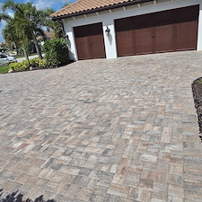 Large-Paver-driveway-that-we-cleaned-and-put-fresh-sand-in-the-joint-then-sealed-in-Esplanade-of-Lakewood-Ranch 1