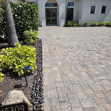 Large-Paver-driveway-that-we-cleaned-and-put-fresh-sand-in-the-joint-then-sealed-in-Esplanade-of-Lakewood-Ranch 0