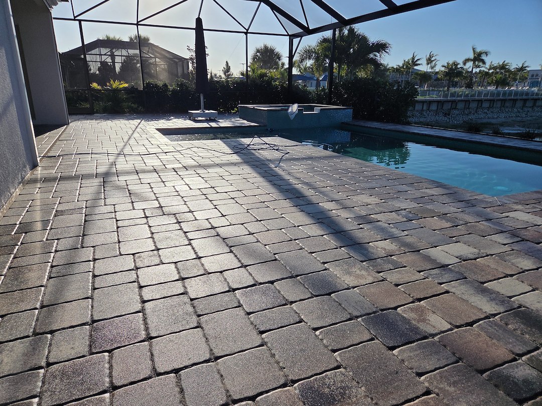 Multiple Driveways and Pool Deck Pavers Cleaned and Sealed in the Beachwalk Community in Englewood FL This Week. Thumbnail