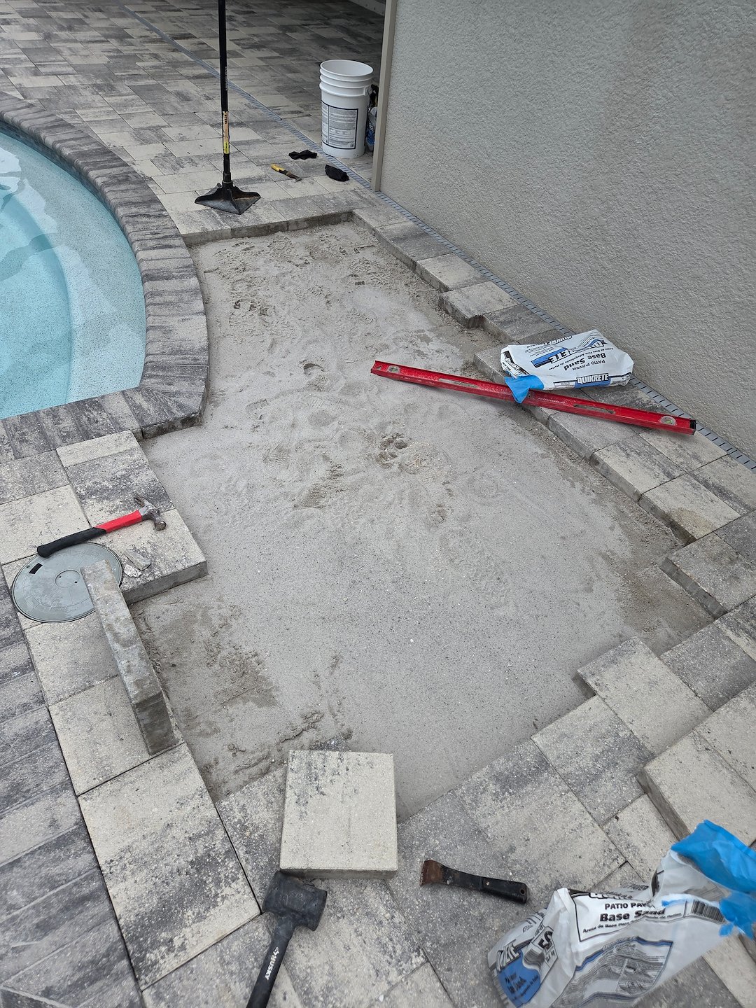 Paver raising and leveling repair job along with a wash and seal on the paver poold deck. Thumbnail