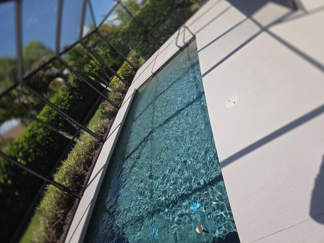 Solid Concrete Pool Deck Coating and Paver Driveway Sealing in the Esplanade Community of Palmer Ranch Thumbnail