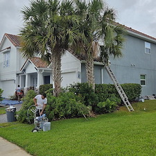 This-complete-exterior-painting-on-a-2-story-with-White-body-and-black-trim-in-the-Heron-Landing-Community-turned-out-beautiful 1