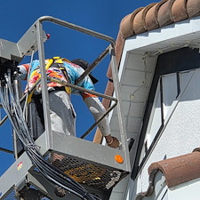 This-complete-exterior-painting-on-a-2-story-with-White-body-and-black-trim-in-the-Heron-Landing-Community-turned-out-beautiful 5