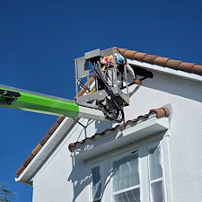 This-complete-exterior-painting-on-a-2-story-with-White-body-and-black-trim-in-the-Heron-Landing-Community-turned-out-beautiful 8