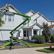 This-complete-exterior-painting-on-a-2-story-with-White-body-and-black-trim-in-the-Heron-Landing-Community-turned-out-beautiful 10