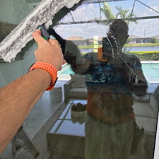 This-new-customer-in-The-Isles-of-Lakewood-Ranch-got-the-VIP-Soft-wash-on-house-and-pool-cage-Paver-Driveway-sealed-and-beautiful-Marble-Tile-Pool-Deck-Repaired-and-Restored 0