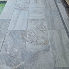 This-new-customer-in-The-Isles-of-Lakewood-Ranch-got-the-VIP-Soft-wash-on-house-and-pool-cage-Paver-Driveway-sealed-and-beautiful-Marble-Tile-Pool-Deck-Repaired-and-Restored 3