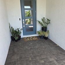 This-new-customer-in-The-Isles-of-Lakewood-Ranch-got-the-VIP-Soft-wash-on-house-and-pool-cage-Paver-Driveway-sealed-and-beautiful-Marble-Tile-Pool-Deck-Repaired-and-Restored 5