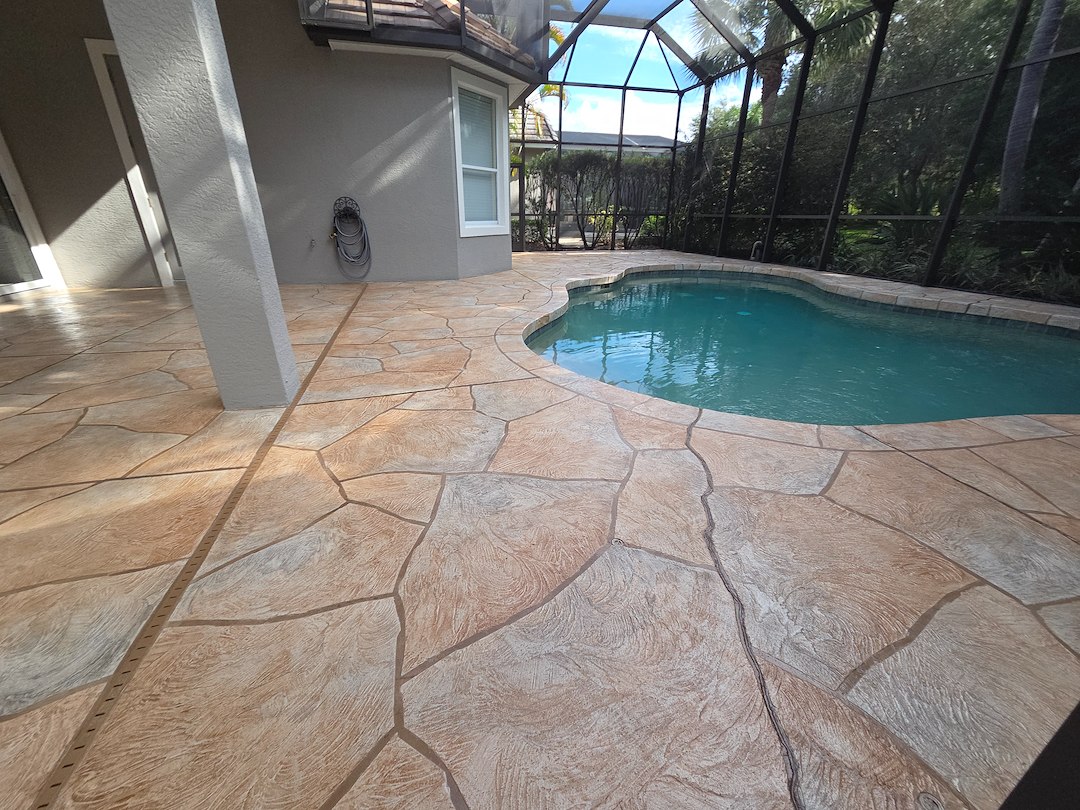 We Cleaned and Sealed This Decorative Concrete Pool Deck In The Country Club East Community of Lakewood Ranch Restored Back To It's Original Luster. Thumbnail