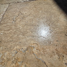 Wet-look-travertine-pool-deck-and-house-soft-wash-in-Naples-FL 1